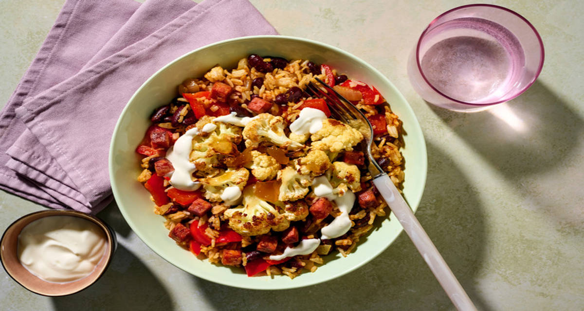Roast Cauliflower and Chorizo Loaded Veggie Rice with chilli paste and aioli