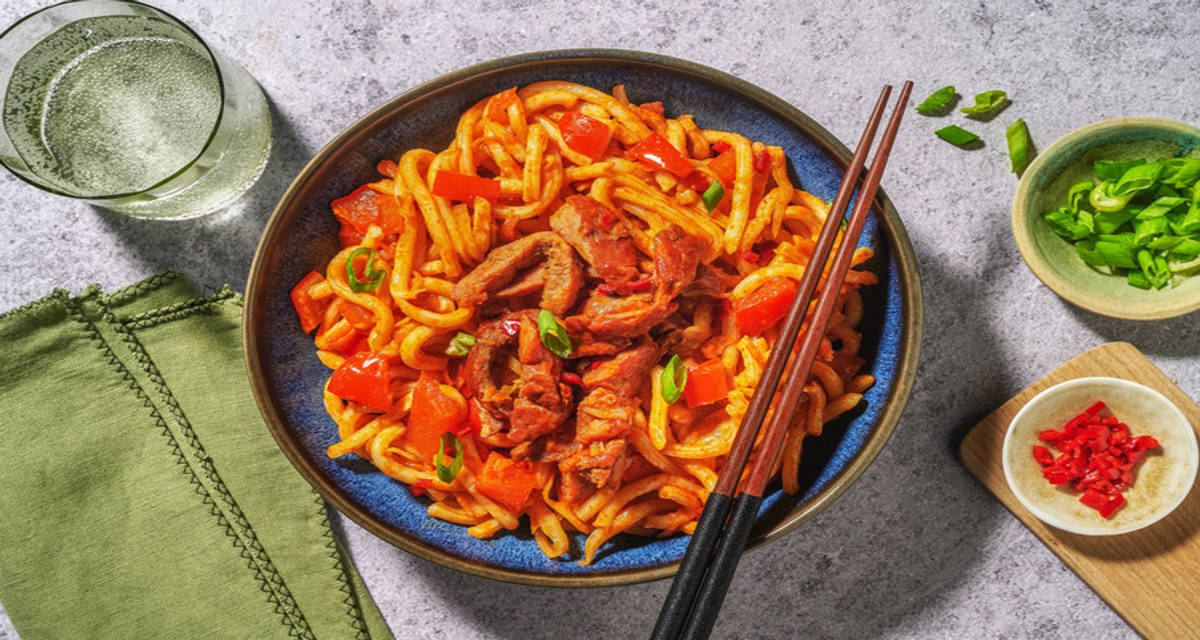 Beef Strip and Szechuan Noodles with bell pepper and coleslaw