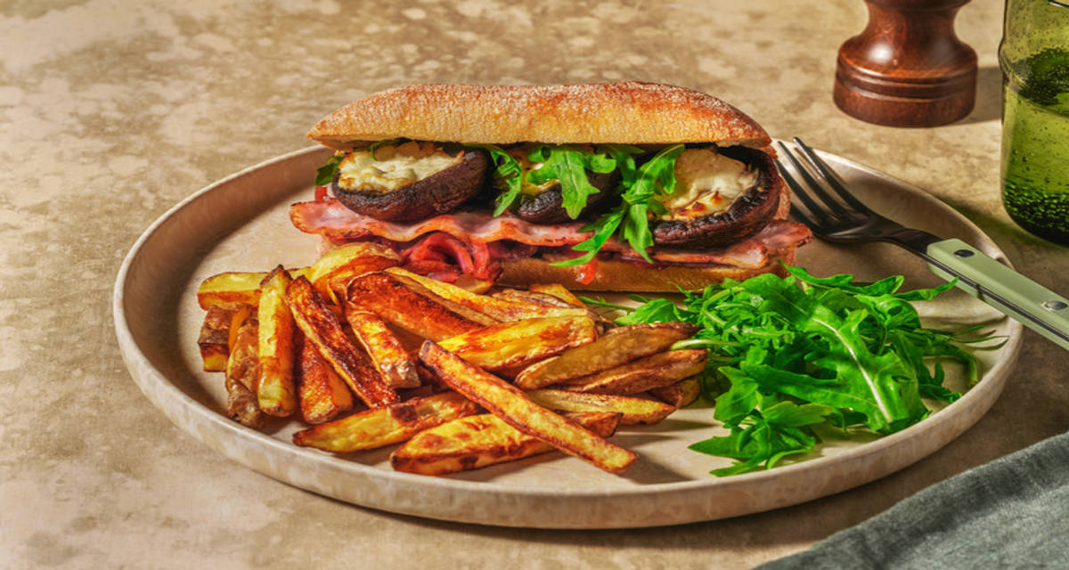 Portobello Mushroom Goat's Cheese Sandwich with Irish Bacon with balsamic onion and potato wedges