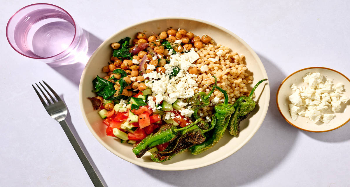 Padron Peppers with Espinacas con Garbanzos with Greek style cheese