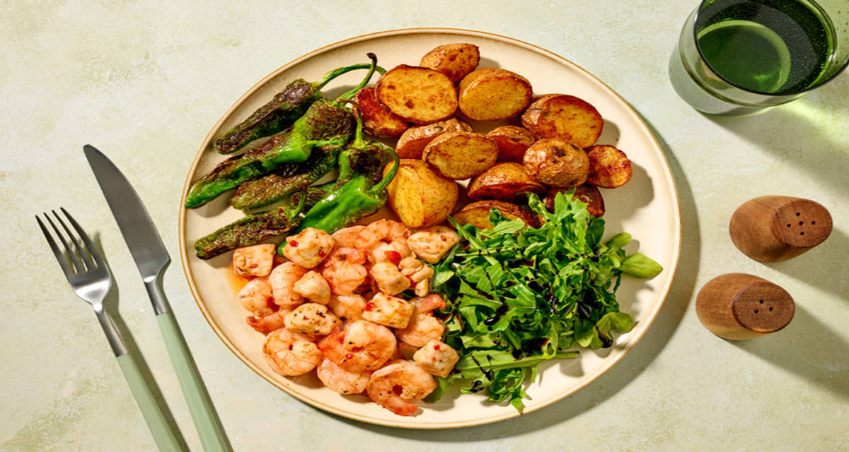 King Prawn Pil Pil with Diced Irish Chicken Breast with padron peppers and paprika potatoes
