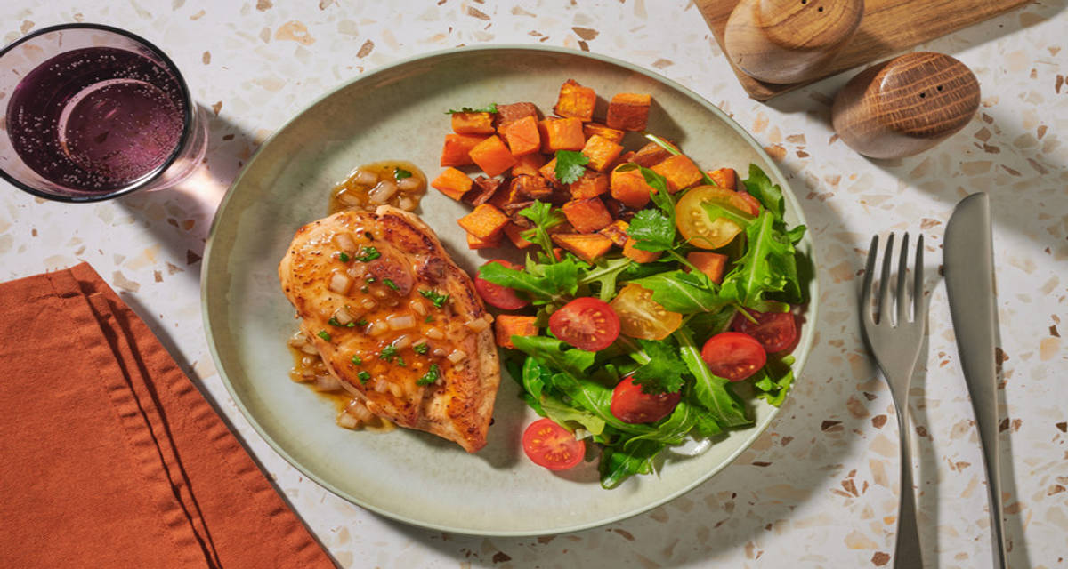 Poc Chuc Inspired and Marinated Chicken Breast with zesty marinade, sweet potato and tomato salad