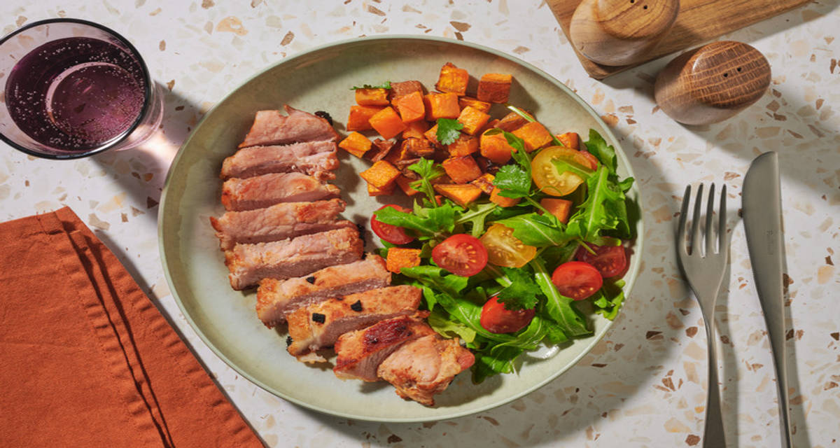 Poc Chuc Inspired Marinated Gammon Steaks with zesty marinade, sweet potato and tomato salad
