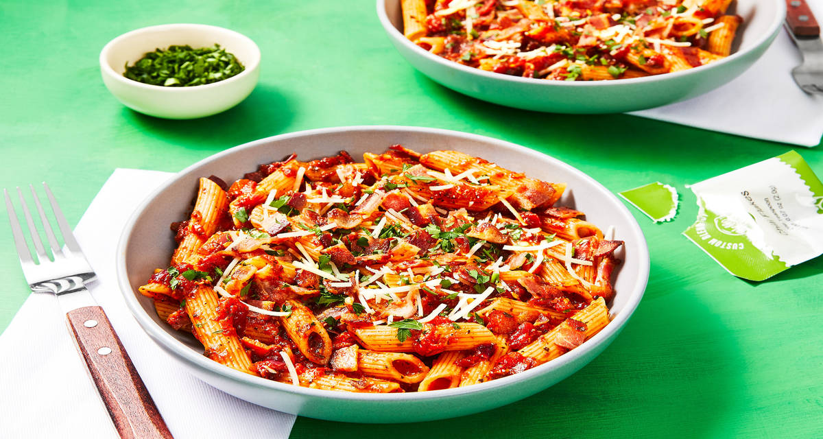 Bacon Penne Arrabiata topped with Parmesan & Parsley