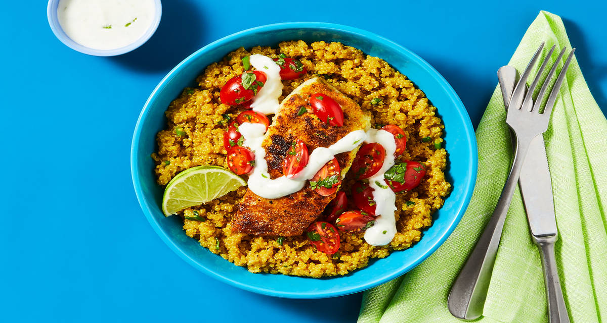 Baja Barramundi with Turmeric Quinoa, Salsa Fresca & Lime Crema