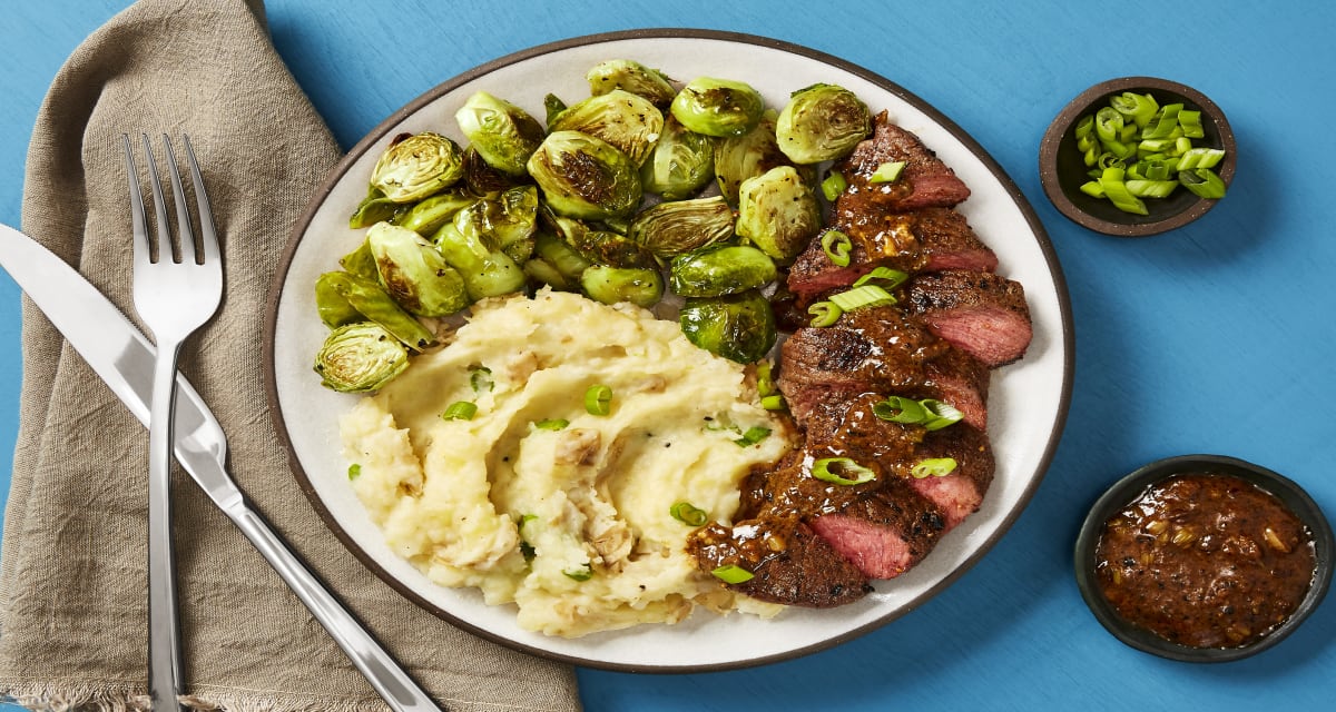 Brown Sugar Bourbon Steak with Creamy Dijon Pan Sauce, Scallion Mashed Potatoes & Roasted Brussels Sprouts-image