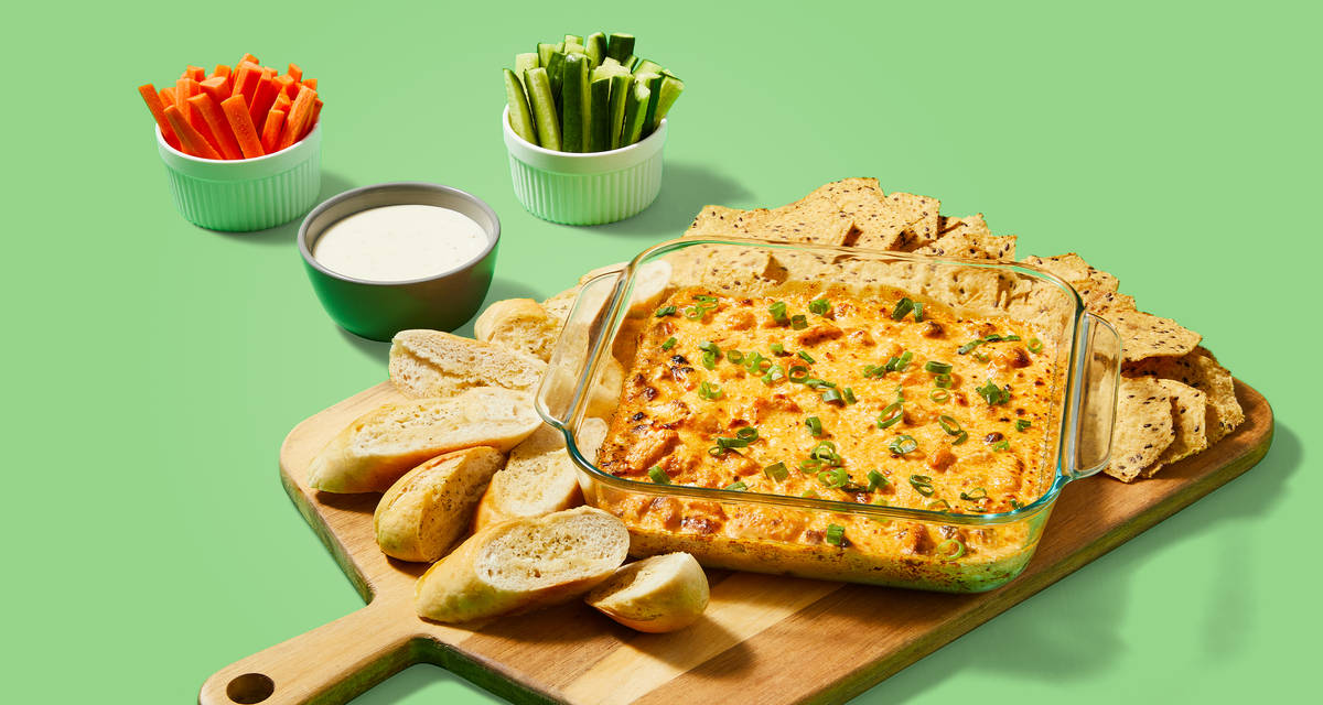 Buffalo Chicken Dip with Toasted Baguette, Tortilla Chips, Carrots, Cucumbers & Ranch | 4-6 servings