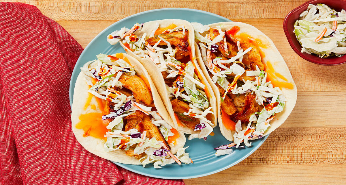 Buffalo Chicken Tacos with Melty Cheddar & a Creamy Ranch Celery Slaw
