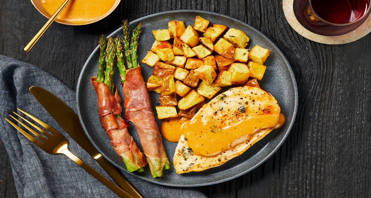 Buttery Garlic-Herb Chicken with Prosciutto-Wrapped Asparagus & Herbed Potatoes