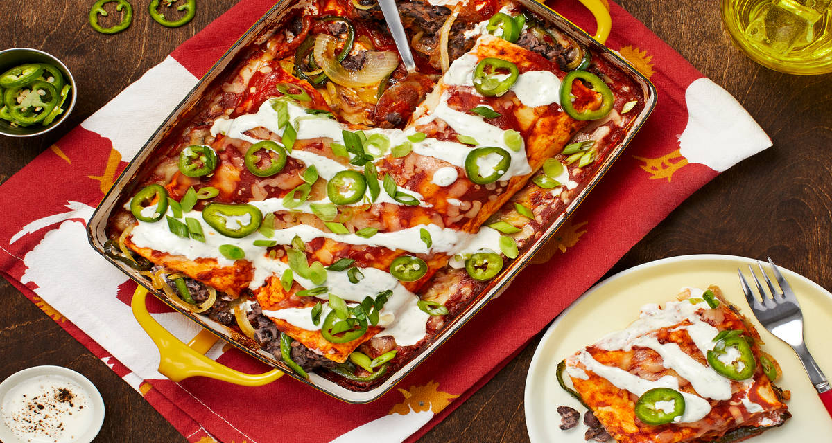 Cheesy Black Bean Enchiladas with Lime Crema and Pickled Jalapeño