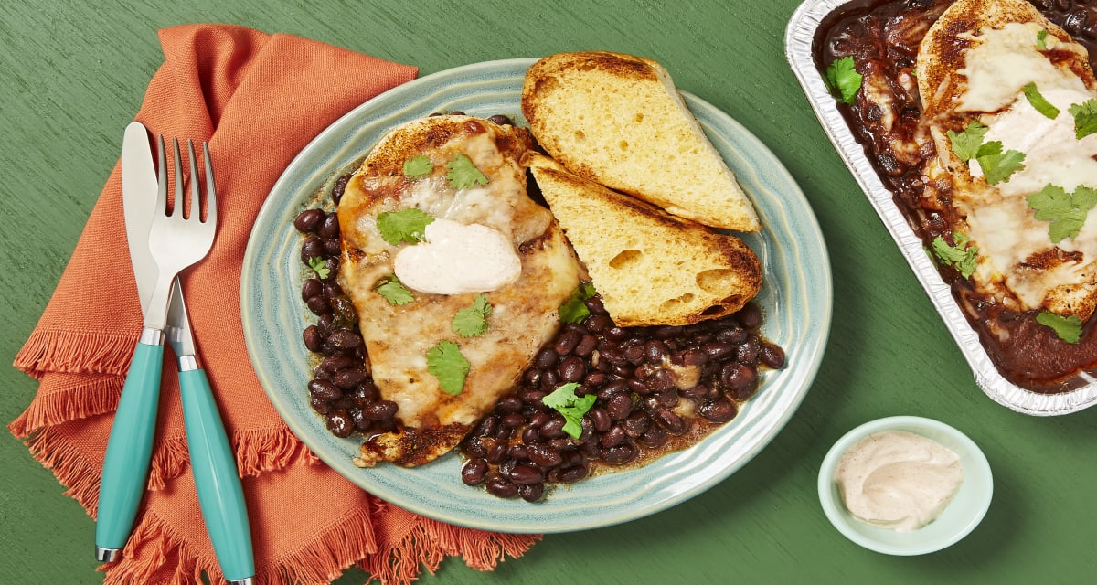 Cheesy Chicken & Spiced Black Beans with Cilantro, Smoky Red Pepper Crema & Garlic Bread-image