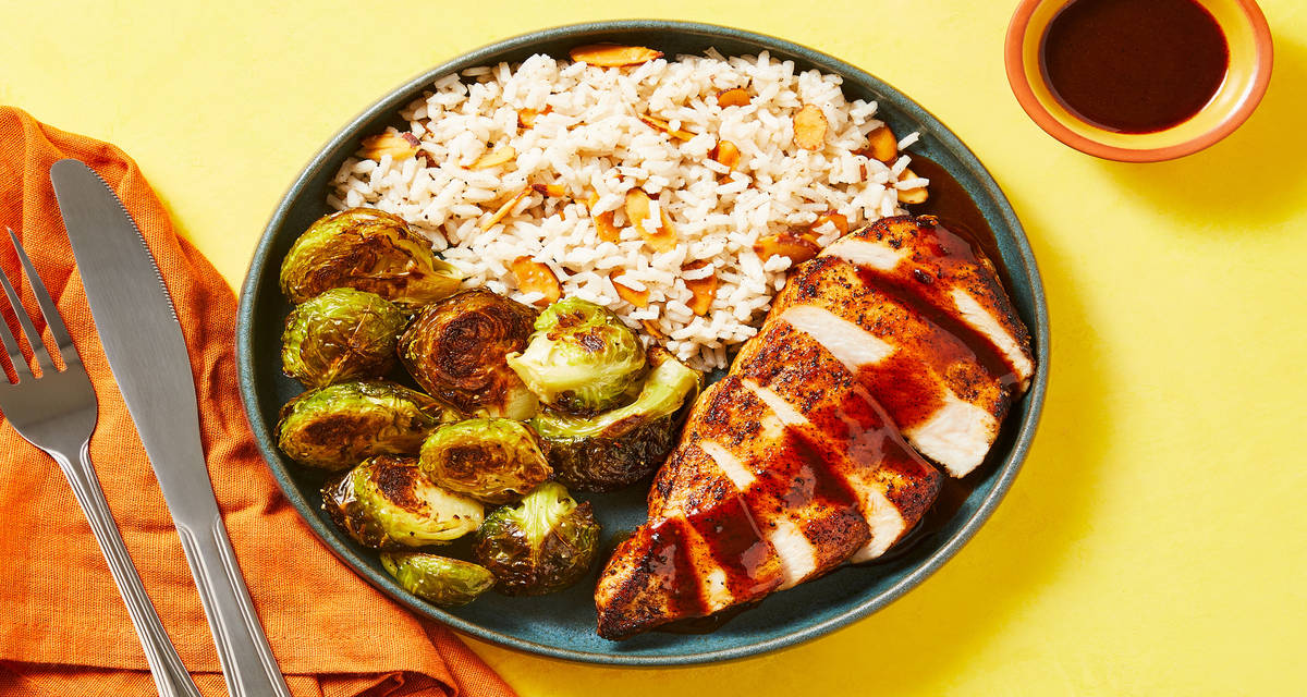 Cherry Ancho Chicken Cutlets with Almond Brown Butter Rice & Garlicky Brussels Sprouts