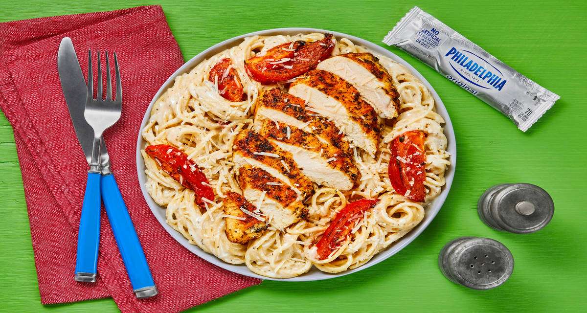 Chicken over Garlic Parmesan Spaghetti with Philadelphia Cream Cheese & Tuscan Roasted Tomatoes