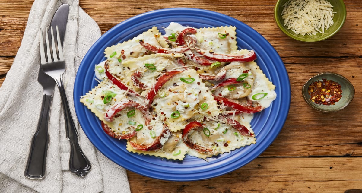 Chicken Romesco Filled Ravioli in a Creamy Garlic Sauce with Roasted Bell Pepper & Parmesan-image