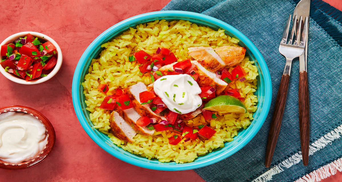 Chipotle Chicken and Savory Yellow Rice with Salsa Fresca and Spicy Lime Cream