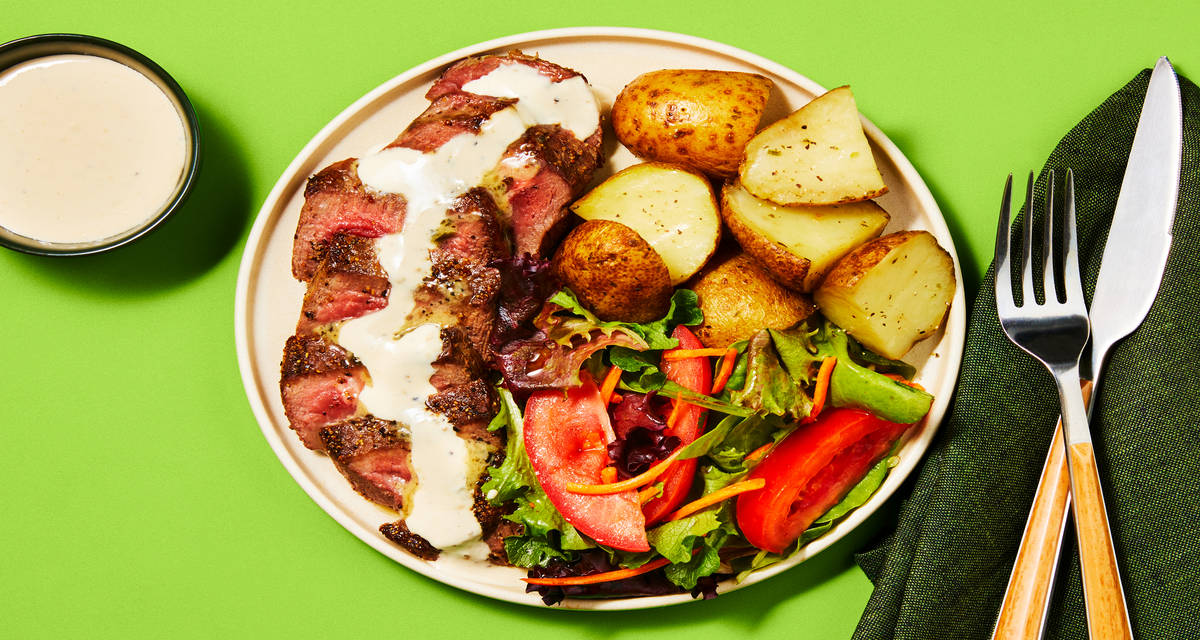 Down Home Steak ’n’ Potatoes Garlic Herb Butter, Mixed Greens & Creamy Mustard Sauce