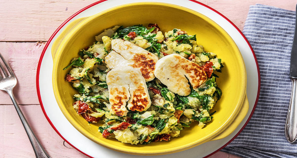 Écrasé de topinambour & épinards au halloumi poêlé servi avec des tomates semi-séchées