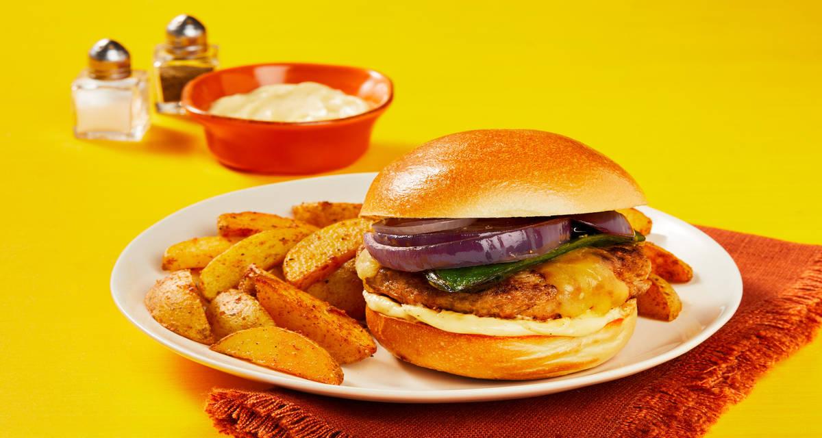 El Paso Pork Burgers stuffed with Monterey Jack & served with Potato Wedges