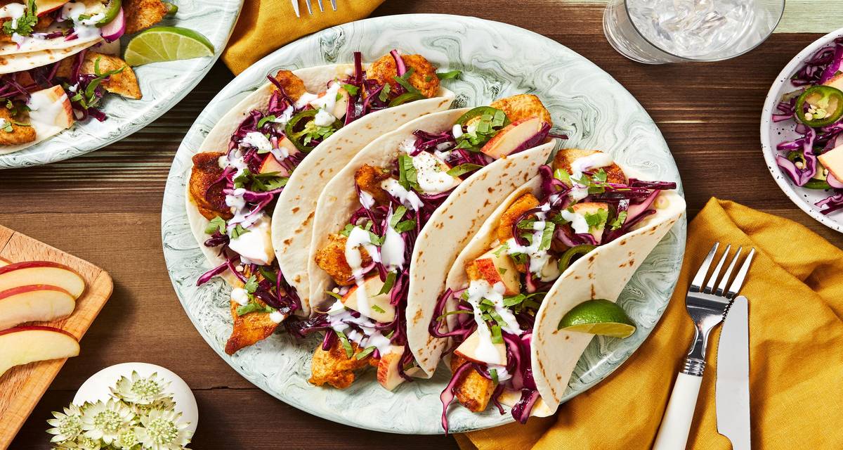 Fiesta Chicken Tacos With a Spicy Apple Cabbage Slaw and Lime Crema