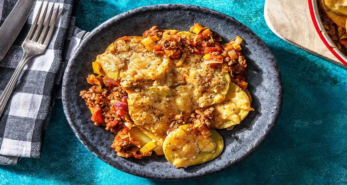 Gratin de poireau & viande hachée épicés à l'italienne préparé avec des pommes de terre et fromage vieux