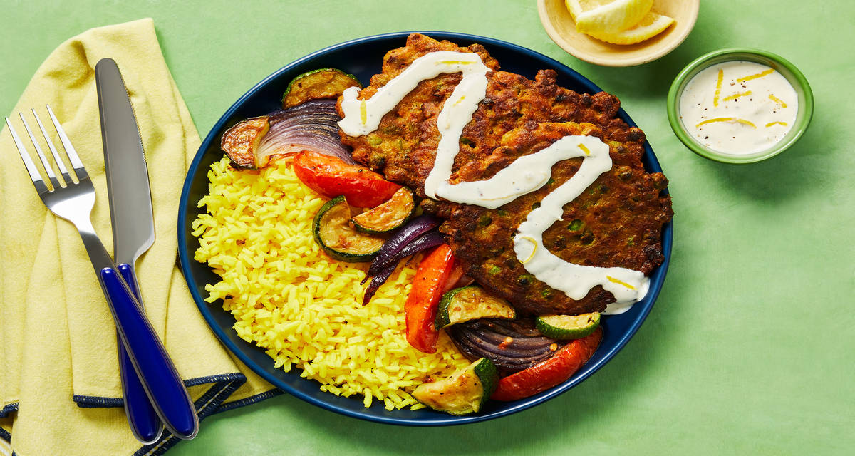 Shawarma-Rama Green Pea & Feta Patties with Yellow Rice, Roasted Veggies & Garlic Lemon Sauce