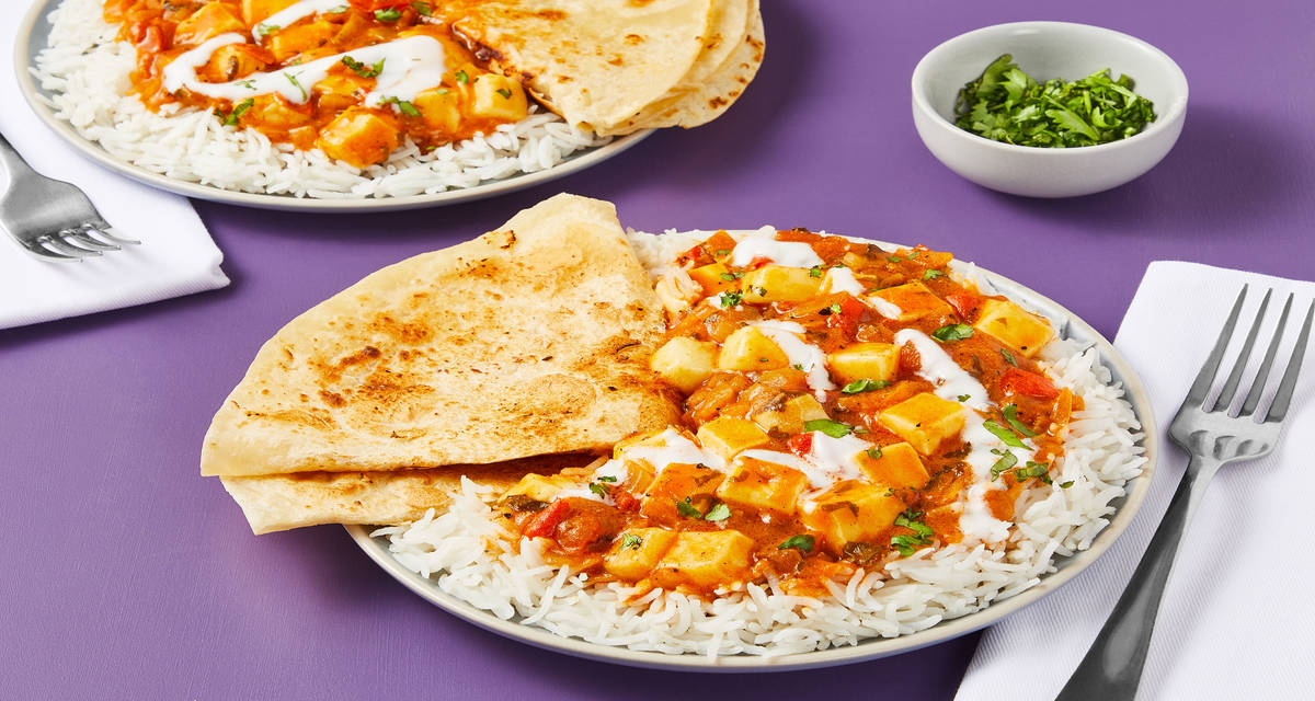 Grilling Cheese Tikka Masala over Rice with Garlic Roti-Style Tortillas