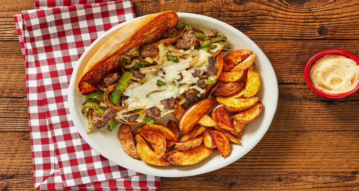Italian Pepper Steak Sandos with Melty Mozzarella & Roasted Potato Wedges