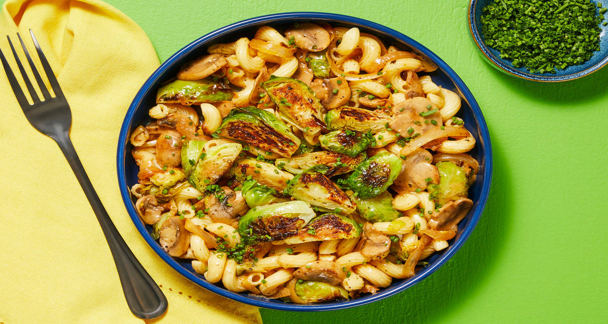 Chicken Sausage & Brussels Sprout Cavatappi with Jammy Onion, Garlicky Mushrooms & Chives