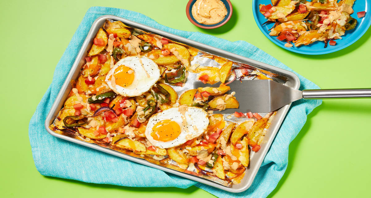 Loaded Fajita Potato Wedges with Fried Egg, Pepper Jack & Zesty Garlic Mayo
