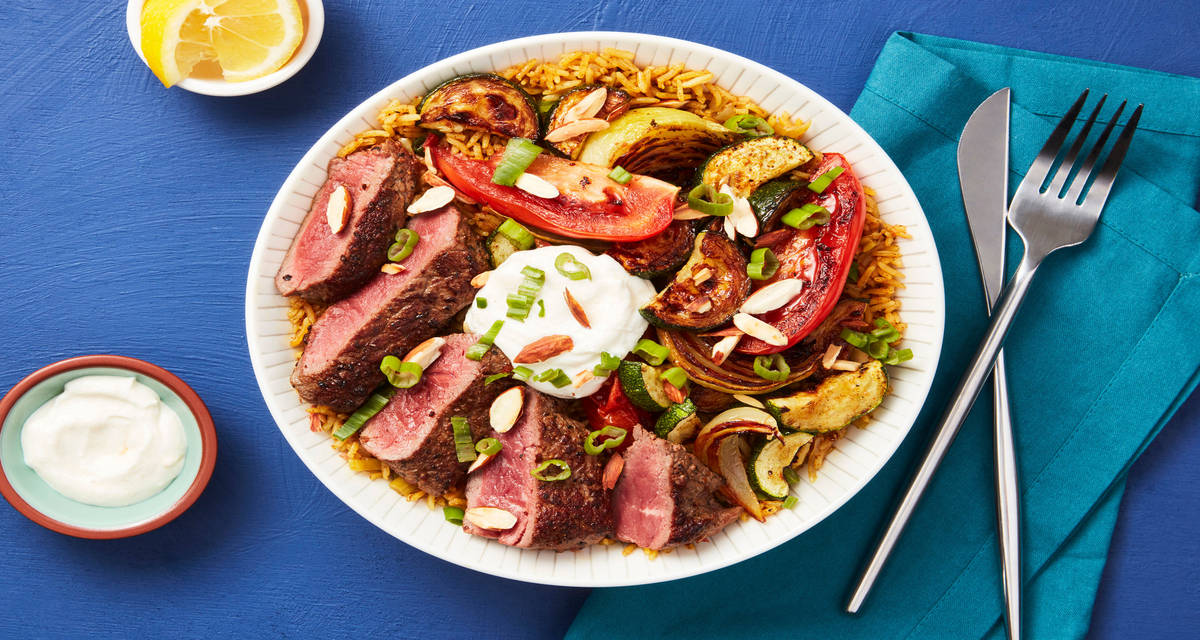 Middle Eastern Steak Bowls with Spiced Basmati Rice, Roasted Veggies & Lemon Garlic Yogurt Sauce