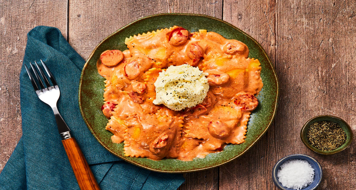 Mushroom Ravioli in a Tomato Cream Sauce with Grape Tomatoes & Ricotta Dollop