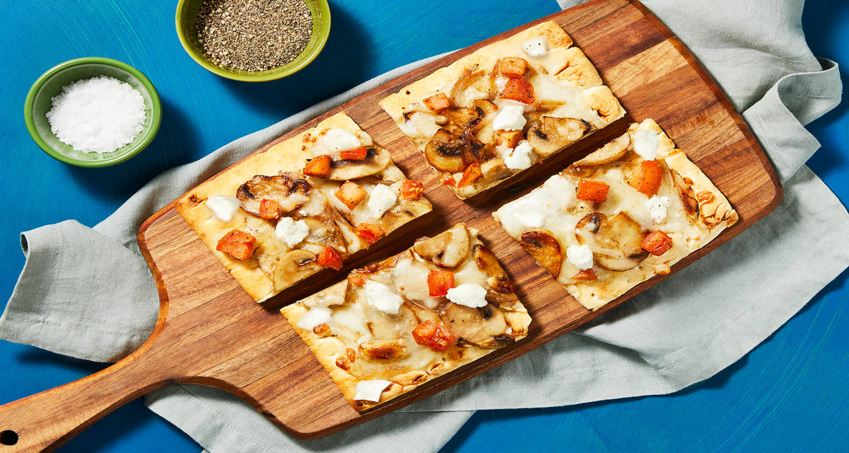 Mushroom, Tomato & Goat Cheese Flatbreads with Garlicky White Sauce & Mozzarella