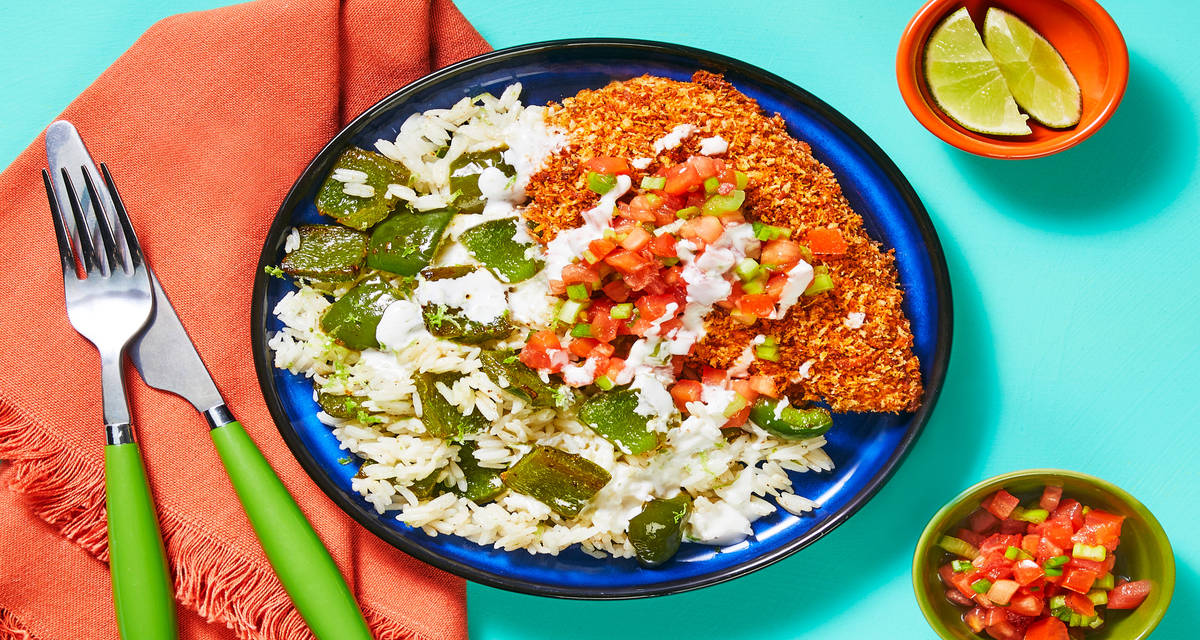 Nacho-Inspired Crispy Crust Chicken served with Green Bell Pepper Rice & Traditional Fixings