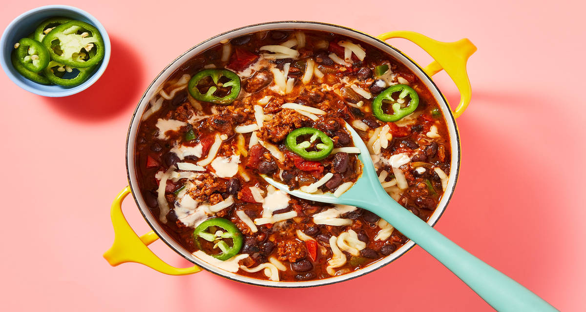 One-Pot Plant-Based Protein & Bean Chili with Hot Sauce Crema & Monterey Jack Cheese