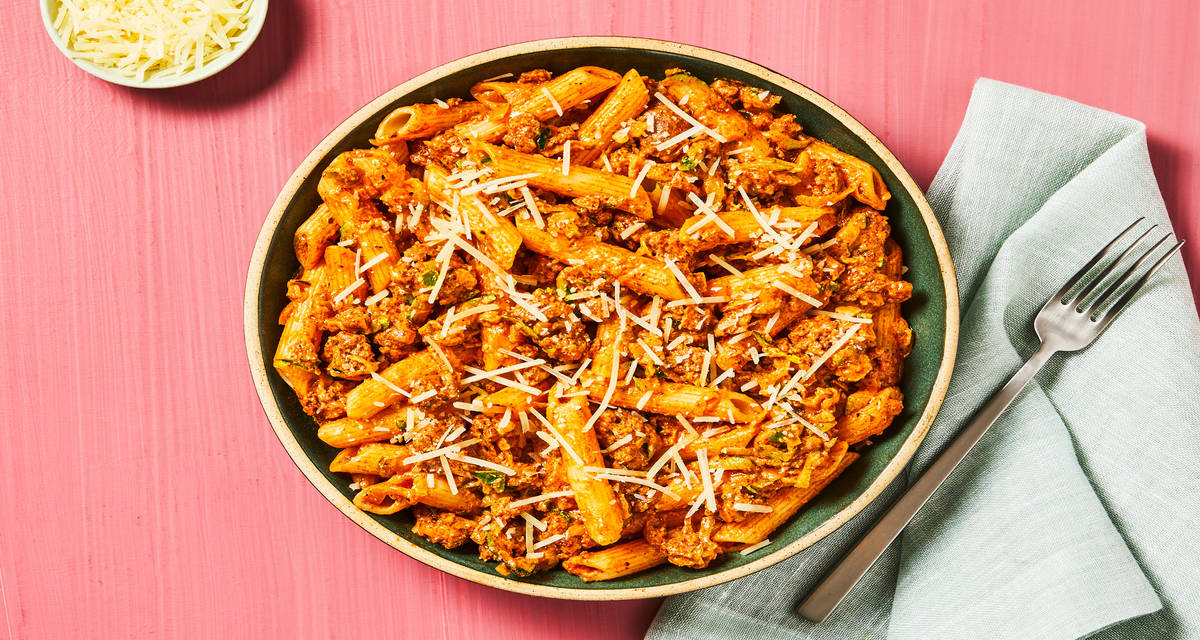 Penne with Beef & Zucchini Ragù plus Parmesan Cheese