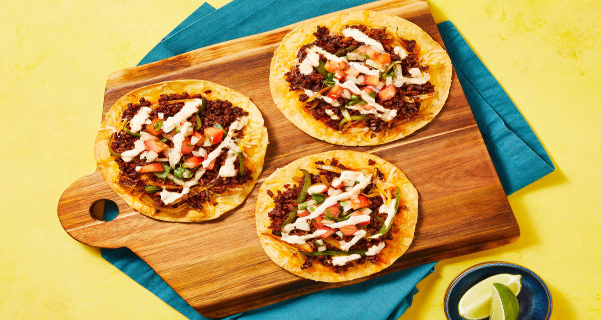 Plant-Based Protein & Cheese Tostadas with Long Green Pepper, Tomato Salsa & Hot Sauce Crema