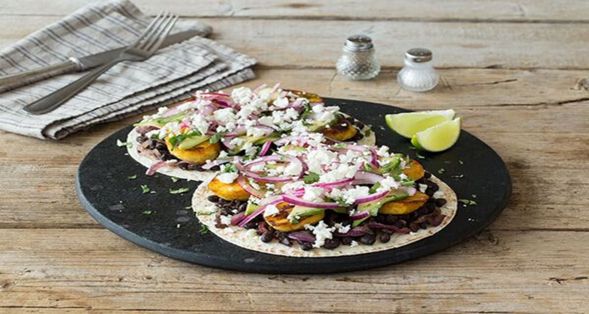 Plantain and Black Bean Tostadas with Pickled Red Onion, Avocado, and Feta-image