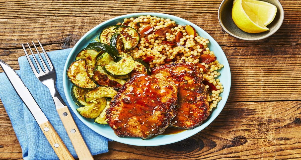 Pork with Peach Thyme Pan Sauce with Zesty Zucchini & Almond Garlic Couscous