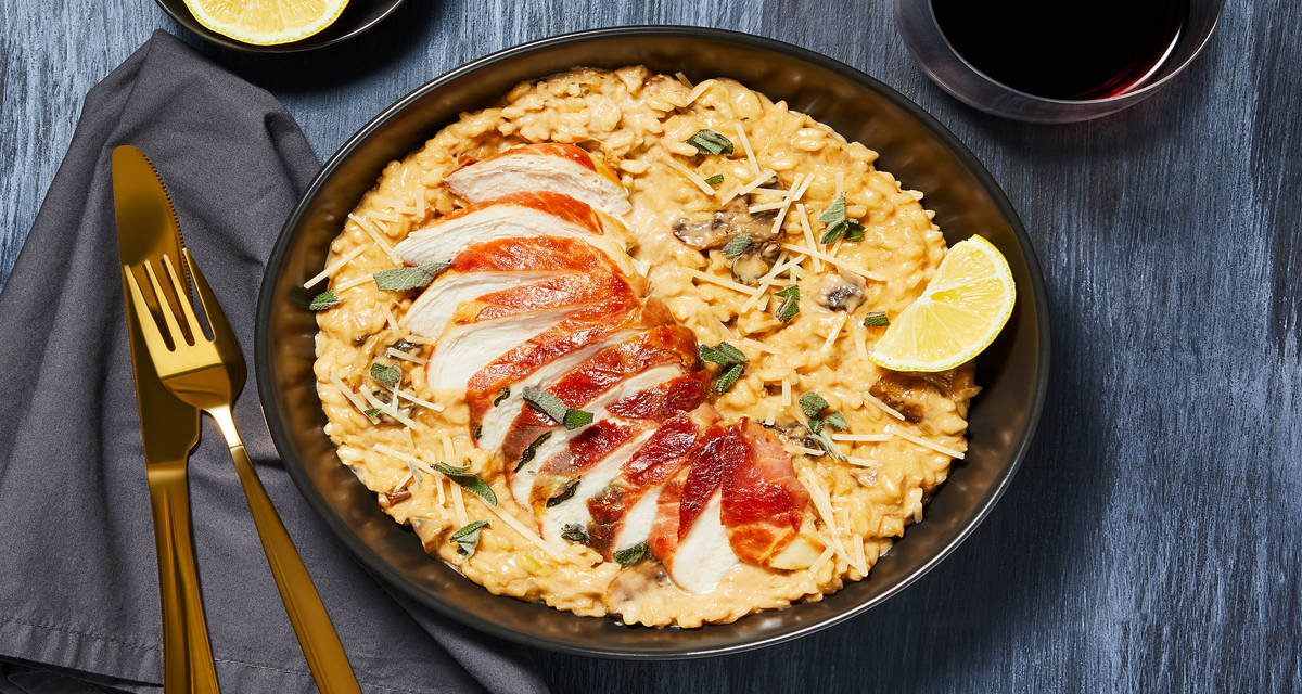 Prosciutto-Wrapped Chicken with Sage over Truffle Mushroom Risotto & Parmesan