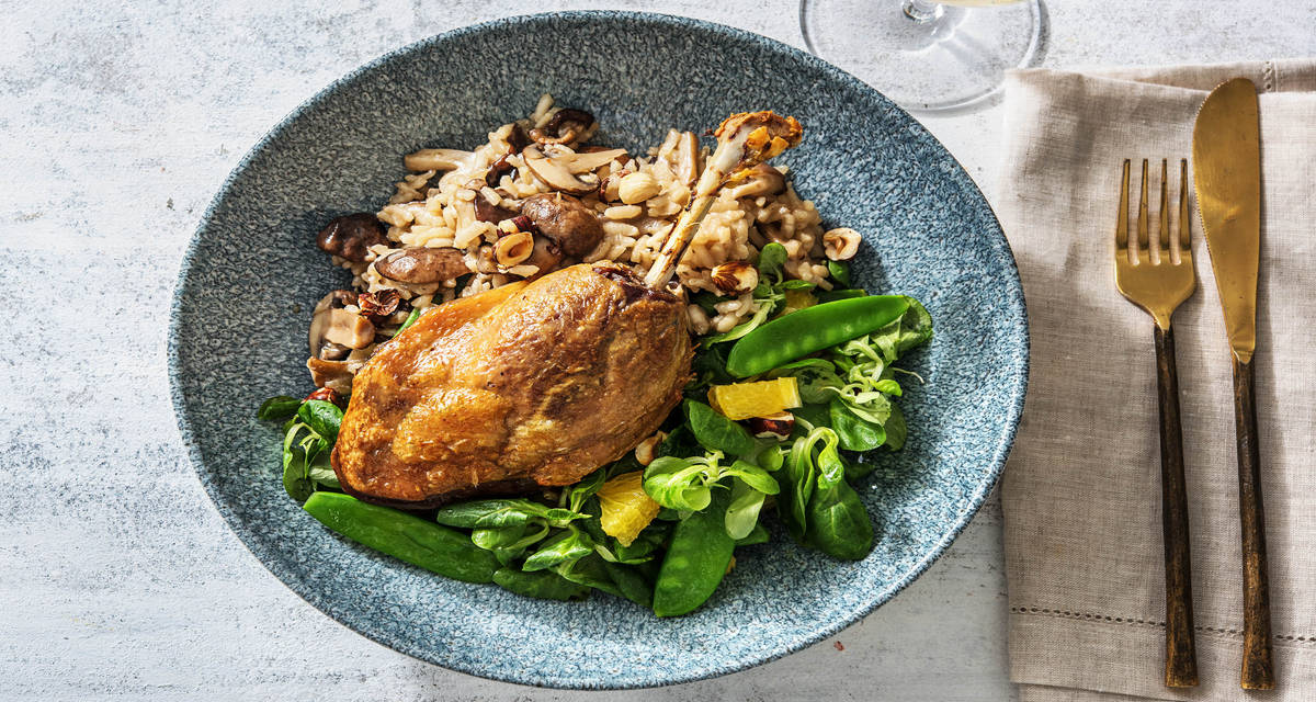Cuisse de canard et risotto aux shiitakés Accompagné d'une salade à l'orange et aux pois mange-tout