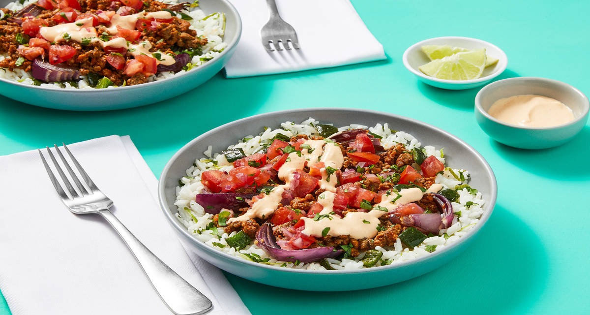 Saucy Beef Burrito Bowls with Poblano, Crema, Salsa & Cilantro Lime Rice