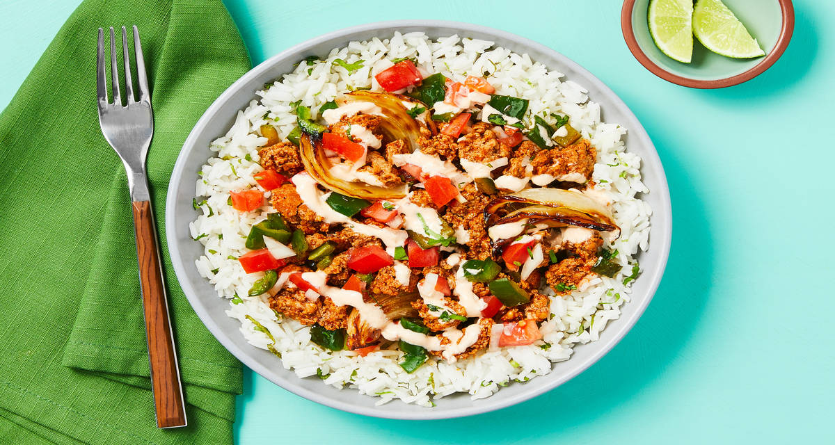 Saucy Beef Burrito Bowls with Cilantro Lime Rice, Salsa Fresca & Smoky Crema