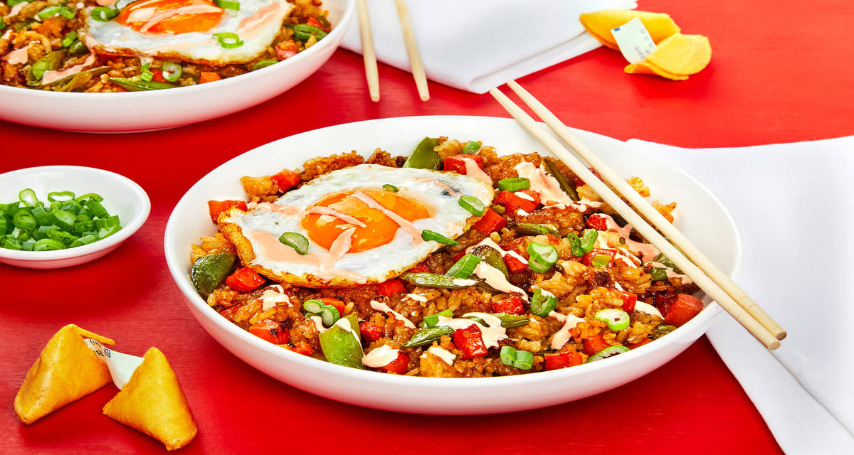 Sesame Sweet Soy Fried Rice with Carrots, Snap Peas, a Fried Egg & Sriracha Mayo