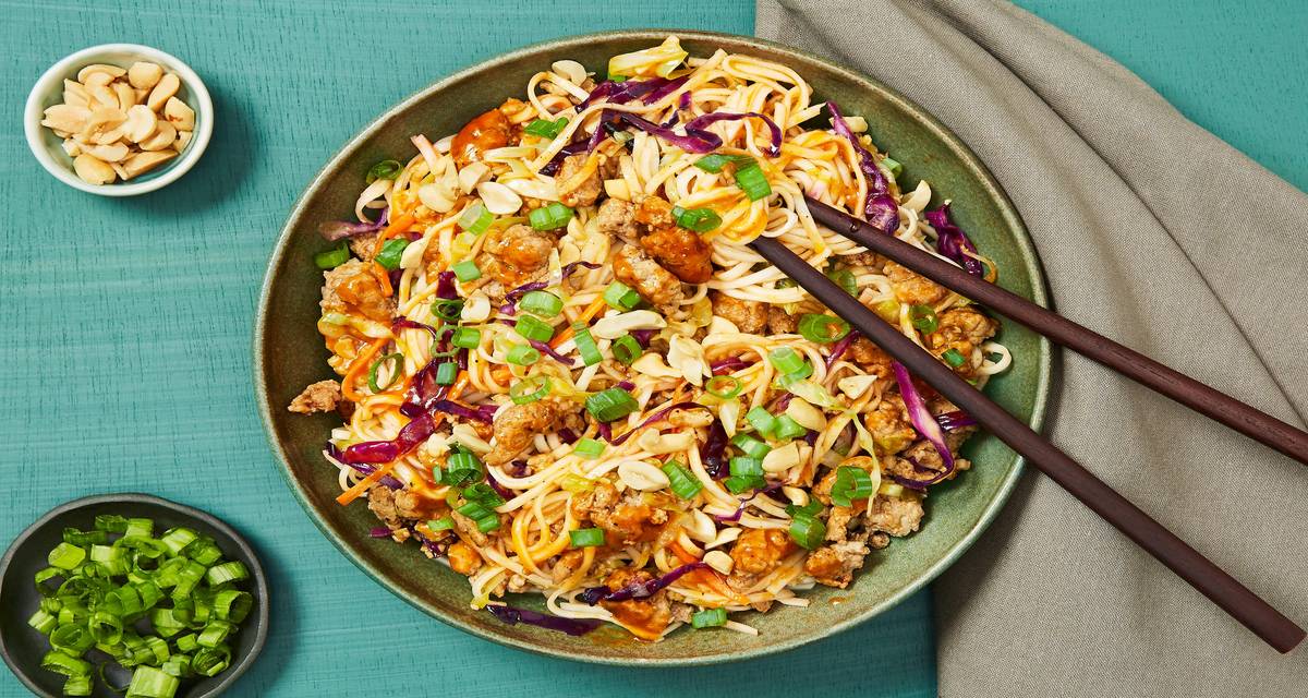 Sesame Szechuan Pork Noodles with Rainbow Cabbage & Peanuts