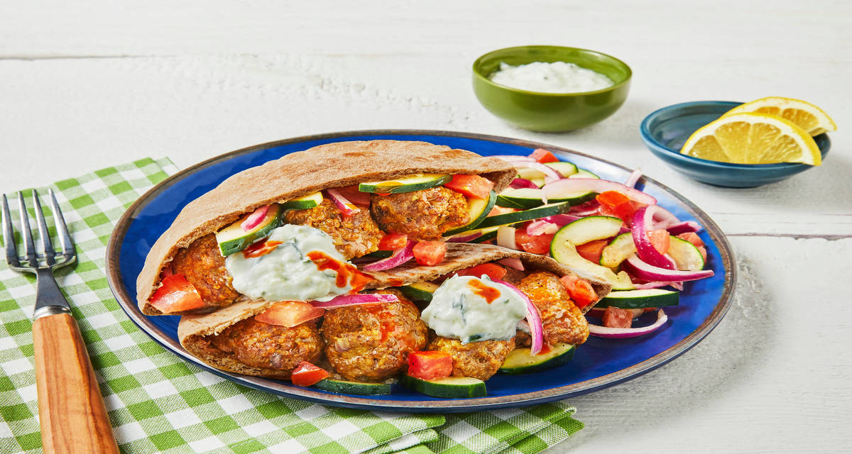 Shawarma-Spiced Meatball Pitas with Israeli Salad & Tzatziki