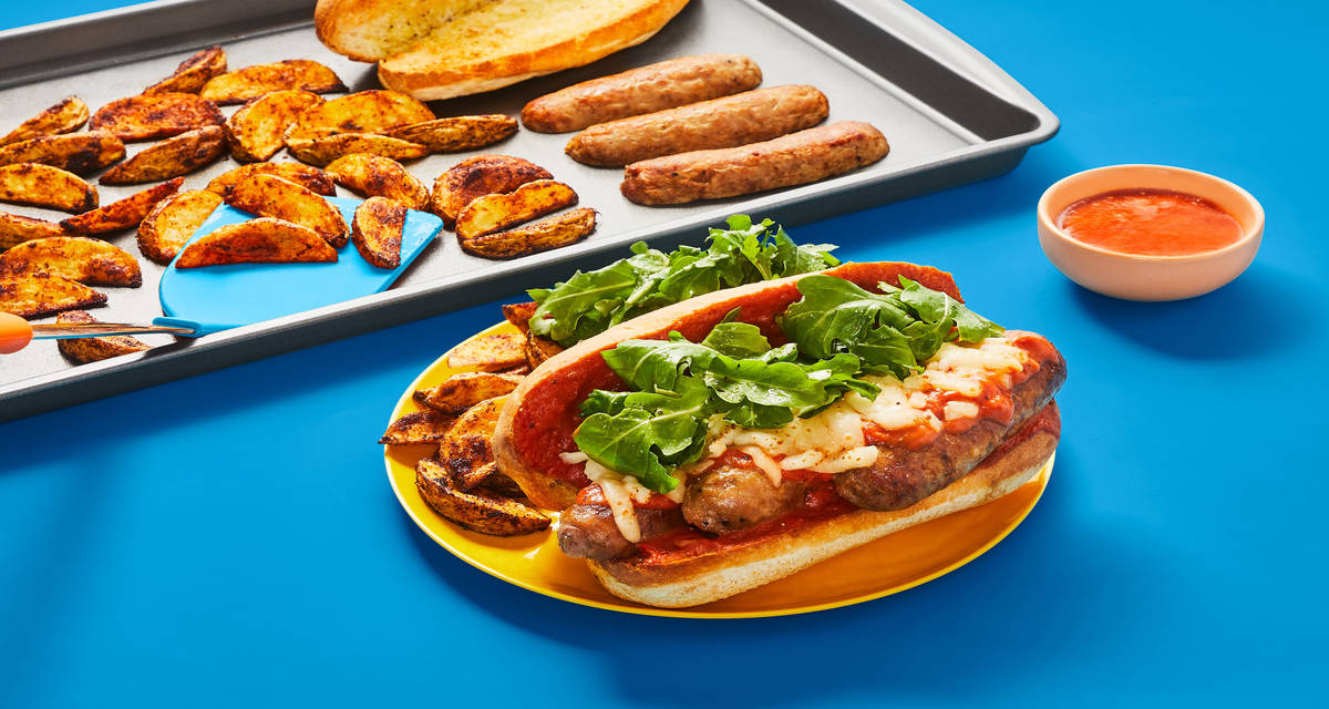 Sheet Pan Sausage & Arugula Sandos with Melty Mozz, Pink Sauce & Potato Wedges