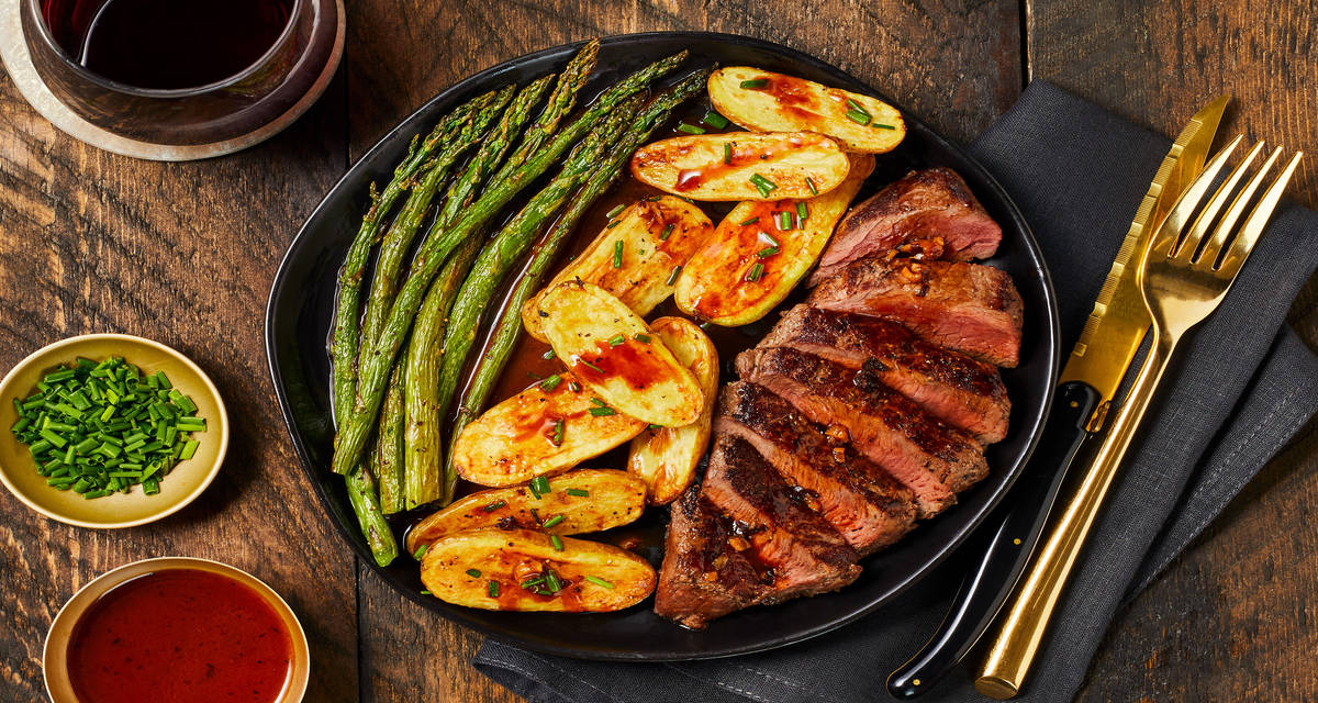 Sirloin & Roasted Garlic Pan Sauce with Chive Roasted Fingerling Potatoes & Asparagus