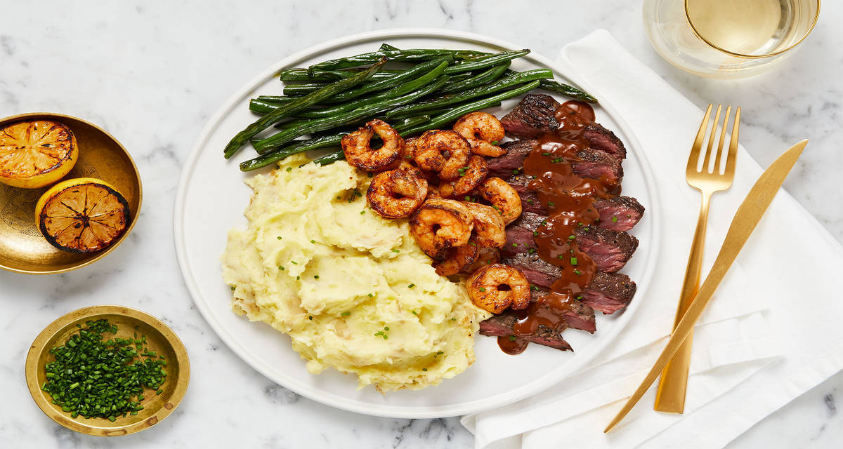 Sirloin topped with Lemon-Paprika Shrimp plus Crème Fraîche Mashed Potatoes & Roasted Green Beans
