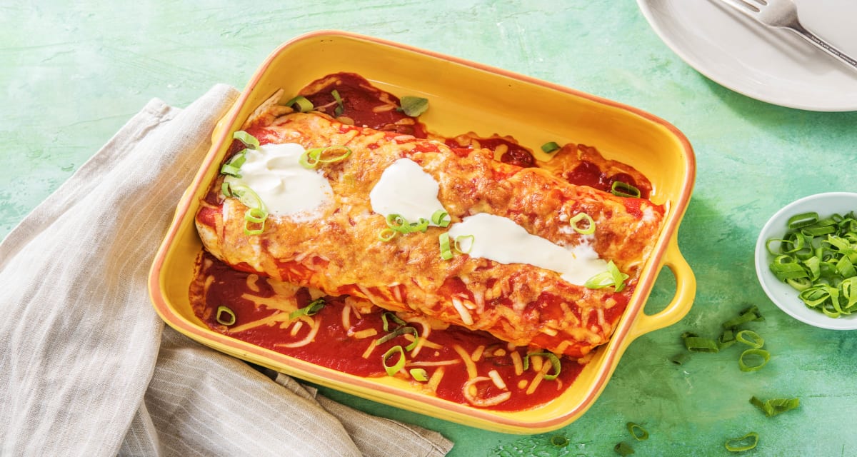 Smothered Chicken Enchiladas with Poblano Pepper, Onion, and Sour Cream image