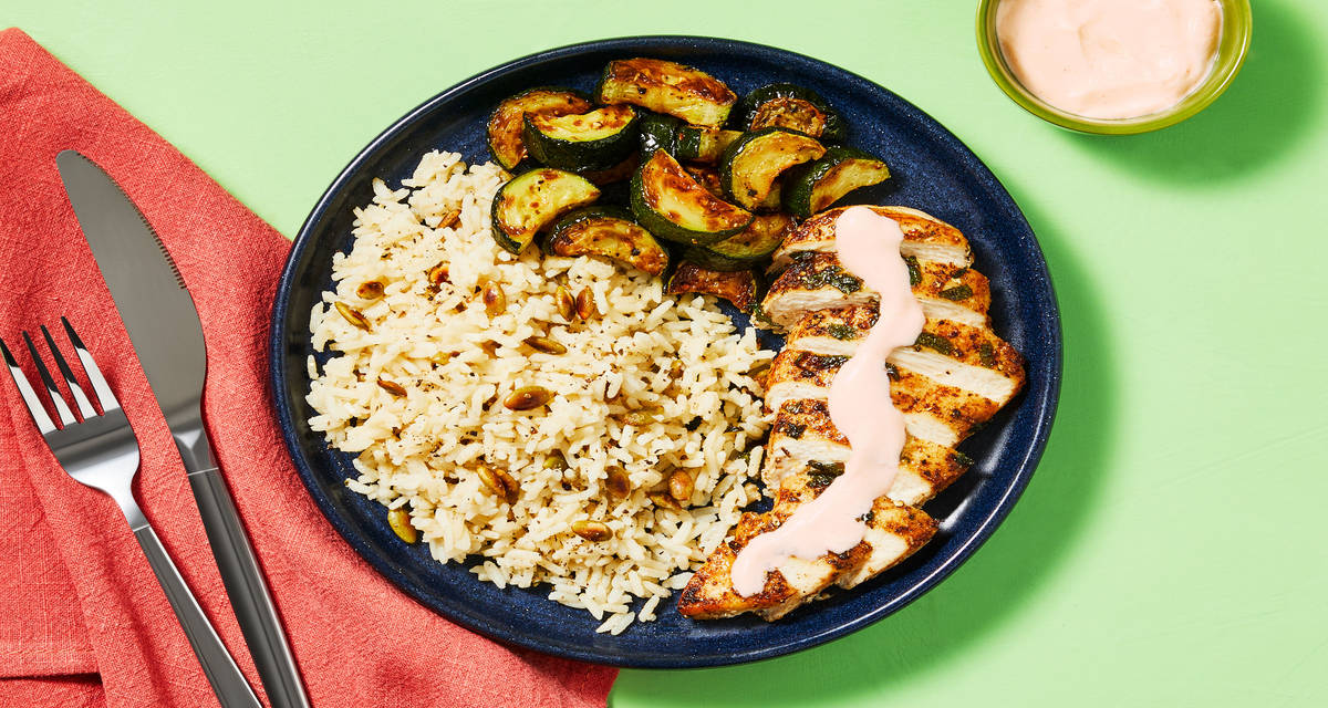 Southwest-Spiced Chicken & Cumin Rice with Roasted Zucchini, Smoky Crema & Toasted Pepitas